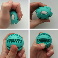 Interactive rubber slow feeder dog ball by My Store with textured surface for engaging play and slow feeding.