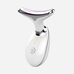 My Store facial massager with 7 color wave design, microcurrent face and neck skin firming beauty device, close-up of device on skin