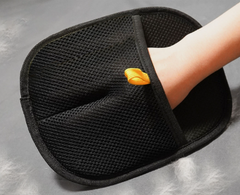 My Store fur remover glove with textured surface for removing pet hair and lint from clothing and furniture.