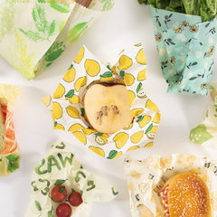 Cotton beeswax fresh-keeping cloth with colorful beeswax-coated fabric for food storage and wrapping.