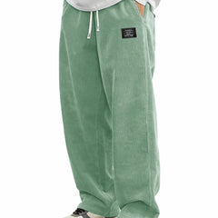 Men's relaxed-fit corduroy casual pants in earth tone, showcasing comfortable fit and textured fabric.