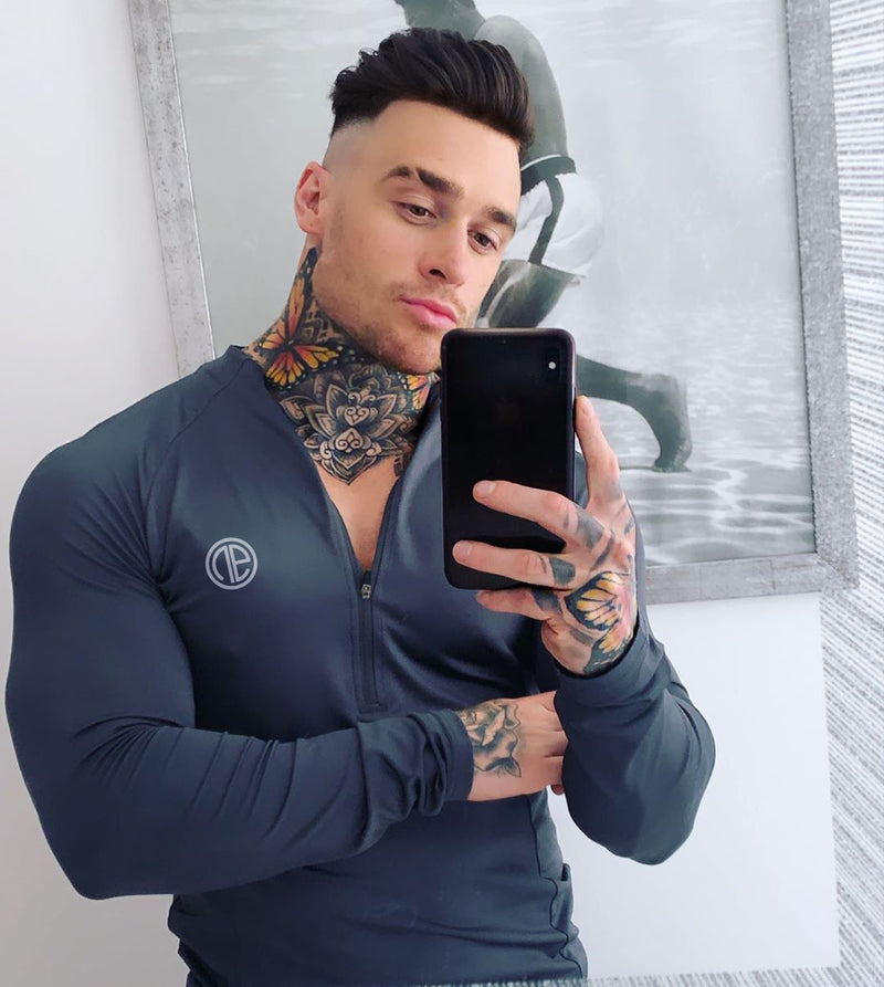 Black men's zipper neck fitness shirt with long sleeves, ideal for gym and sport activities, from My Store.