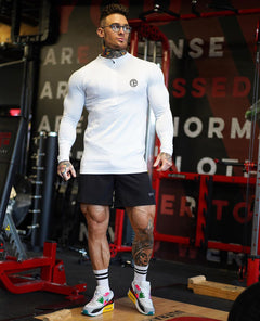 Black men's zipper neck fitness shirt with long sleeves, ideal for gym and sports activities, by My Store.