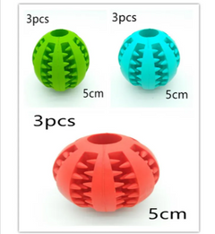 Interactive rubber slow feeder dog ball from My Store, featuring textured surface and durable design for engaging pet play.