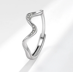 Silver water wave fashion ring with intricate design, featuring a sleek, modern style and polished finish.