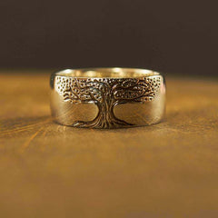 Simple retro carved Tree of Life ring with intricate tree design, silver-tone band showcasing detailed craftsmanship.
