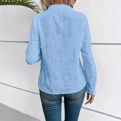 Embroidered hollow-out long-sleeve button-up women’s shirt in lightweight fabric with intricate embroidery details.
