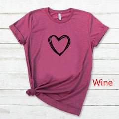 Woman wearing a white short sleeve heart print T-shirt with an O-neck, casual summer women's top, relaxed fit, My Store brand.