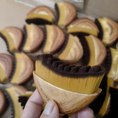 Facial lymph massage brush with soft bristles for gentle skin cleansing and lymphatic drainage therapy.