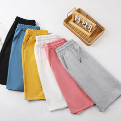 Men's summer casual sport shorts in lightweight fabric with an elastic waistband and side pockets, designed for active wear.