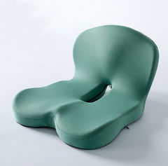 Memory foam ergonomic cushion in navy blue with contoured design for improved back and tailbone support.