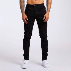 Slim-fit men's denim trousers from My Store, showcasing classic blue jeans with a modern fit and detailed stitching.