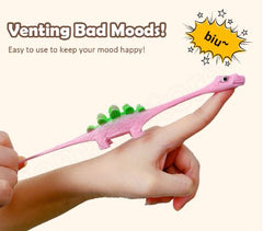 Colorful Dino-Launch Slingshot finger toy with dinosaur design, perfect for outdoor fun and creative play.