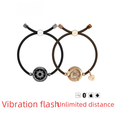 My Store Totwoo smart bracelet with flash and vibration features, designed for couples, shown with sleek black band and digital display.