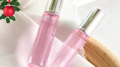 Elegant perfume bottle of My Store's pheromone perfume for women with sleek design and floral accents.