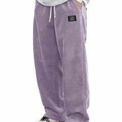 Men's relaxed-fit corduroy casual pants in a neutral color, showcasing the textured fabric and comfortable fit.