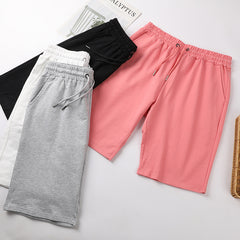 Mens summer casual sport shorts in lightweight fabric with elastic waistband and side pockets, ideal for active wear.