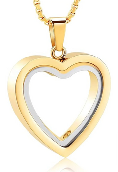 Stainless steel heart-shaped cremation pendant with engraved design, used for memorial keepsakes and remembrance.