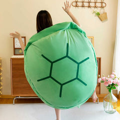 Green wearable turtle shell pillow from My Store, featuring a soft, plush turtle shell design for comfortable wear.