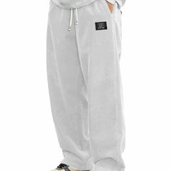 Mens relaxed-fit corduroy casual pants in a neutral color, featuring a comfortable waistband and classic corduroy texture.