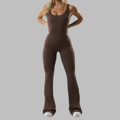 Flared jumpsuit from My Store featuring wide-leg pants and a fitted bodice, displayed on a hanger.