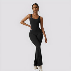 Black flared jumpsuit from My Store with wide-leg design and sleeveless top, styled for casual or evening wear.