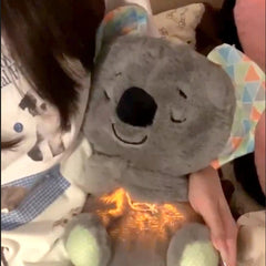 Soft plush breathing bear toy from My Store with a gentle, calming expression perfect for soothing and comfort.