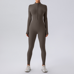 Fleece-lined yoga jumpsuit in black with long sleeves and a fitted design, ideal for comfortable activewear.