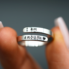 Silver "I Am Enough" ring by My Store featuring a sleek band and engraved motivational message on the surface.