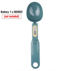Digital measuring spoon scale from My Store, showing a close-up of the compact, stainless steel spoon with digital display for precise measurements.