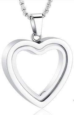 Heart-shaped stainless steel cremation pendant with engraved design, symbolizing remembrance and love.