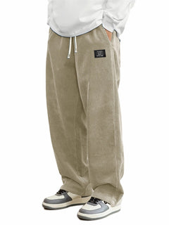 Men's relaxed-fit corduroy casual pants in a neutral color, featuring a comfortable waistband and classic design.