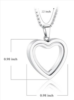 Stainless steel heart-shaped cremation pendant with engraved design, designed for remembrance and holding ashes or keepsakes.