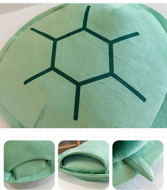 Green wearable turtle shell pillow with adjustable straps designed for comfort and support.
