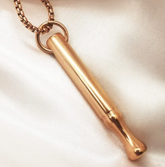 Silver breathing necklace for anxiety relief with a sleek, minimalist design, showcasing a calming pendant on a chain.
