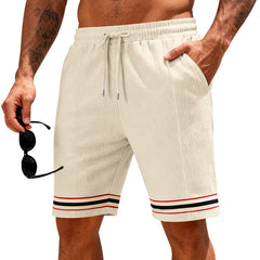 Men's breathable loose-fitting athletic shorts in lightweight fabric, featuring an elastic waistband and side pockets.