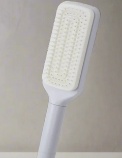 4-in-1 self-cleaning brush from My Store showing a versatile cleaning tool with multiple brush heads and a self-cleaning mechanism
