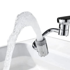 My Store 1080° rotatable faucet extender attached to a kitchen sink faucet for adjustable water flow.