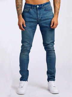 Slim-fit men's denim jeans by My Store, showcasing classic blue jeans with a modern fit and detailed stitching.