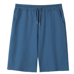 Men's summer casual sport shorts in lightweight fabric with side pockets, designed for comfortable active wear.