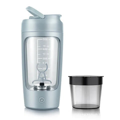 Electric portable whey protein shaker bottle by My Store with a clear plastic body, black lid, and mixing ball inside.