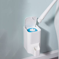 Disposable toilet brush from My Store with a long handle and cleaning bristles for hygienic bathroom cleaning.