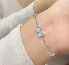 Blue luminous smart butterfly necklace with glowing butterfly pendant, adjustable chain, and sleek design.