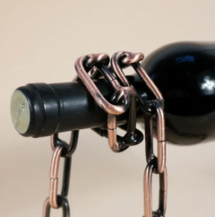 Magic iron chain wine bottle holder by My Store, featuring a decorative chain design holding a wine bottle securely.