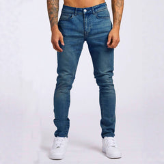 Slim-fit men's denim trousers by My Store, showcasing classic blue jeans with a modern fit and stylish stitching.