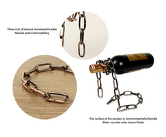 Magic Iron Chain Wine Bottle Holder by My Store featuring a decorative chain design holding a wine bottle