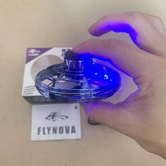 Flynova Mini UFO Spinner by My Store, compact handheld toy with colorful LED lights spinning in the air.