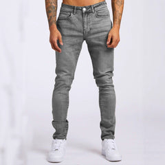 Slim-fit men's denim trousers from My Store, showcasing classic blue jeans with a modern fit and stylish stitching details.