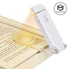 LED USB rechargeable book light by My Store with eye protection, compact design, and adjustable brightness for reading in low light.