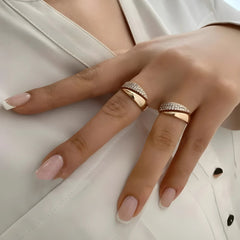 Elegant adjustable sparkle ring featuring shimmering stones and a sleek band, perfect for stylish accessorizing.